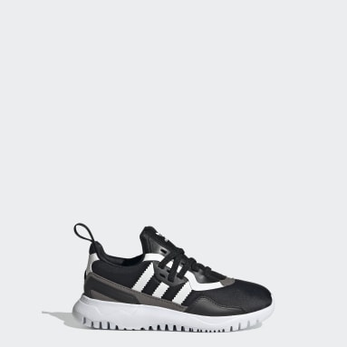 black laceless trainers