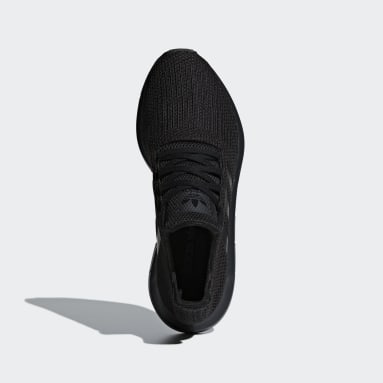 all black adidas trainers