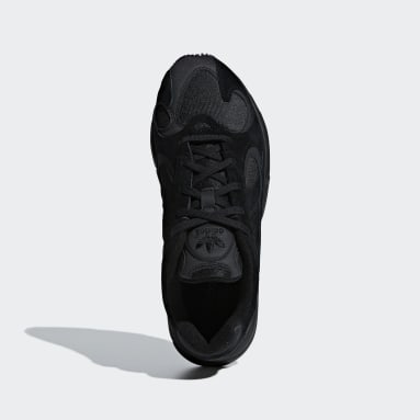 plain black adidas trainers