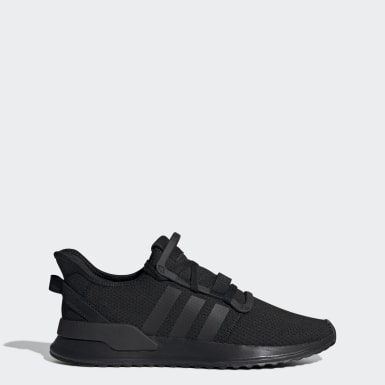 all black adidas trainers