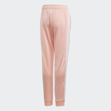 Pantaloni della tuta rosa | adidas IT