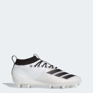 white and black adidas cleats