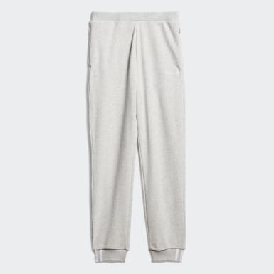 pantaloni zampa adidas