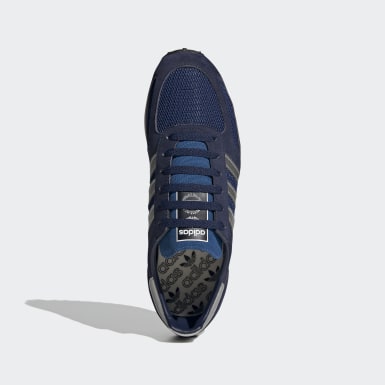 blue adidas trainers
