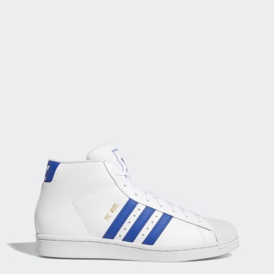 white adidas high top shoes