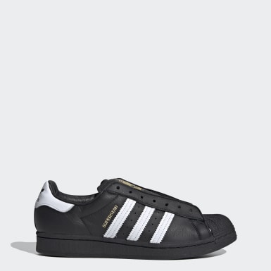 black and gold superstar adidas