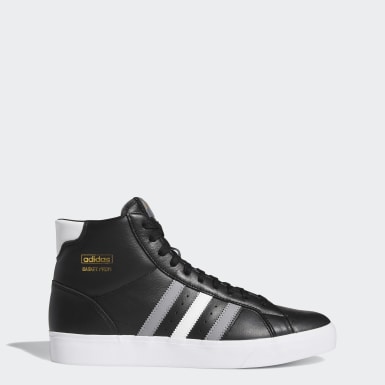 black and gold adidas high tops