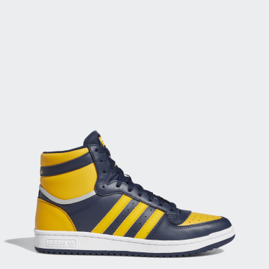 black and blue adidas high tops