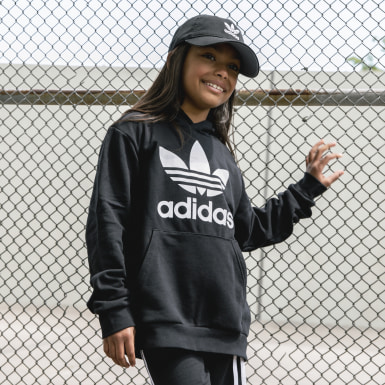 girl with adidas cap