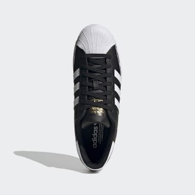 superstar adidas negros