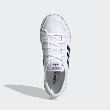 white adidas nizza trainers junior