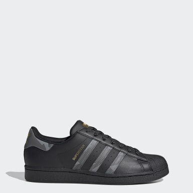 all black adidas shell toes