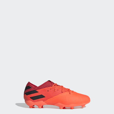 kids orange soccer cleats