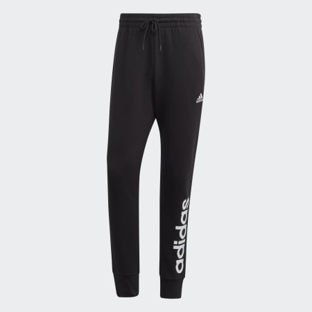 Pantalon en molleton fuselé à logo Essentials