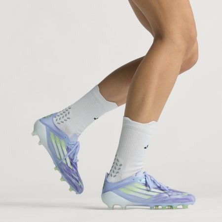 Kopačke F50 Sparkfusion Elite Low za tvrdu podlogu/umjetnu travu