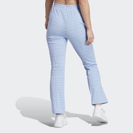 Pantalon taille haute avec jambes évasées et imprimé adidas intégral
