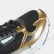 FALCON W Core Black / Core Black / Gold Metallic G26027 FALCON W Core Black / Core Black / Gold Metallic G26027