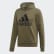 Buzo con capucha Fleece Must Haves Badge of Sport Raw Khaki / Black DT9944 Buzo con capucha Fleece Must Haves Badge of Sport Raw Khaki / Black DT9944