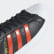Tênis Superstar Core Black / Bold Orange / Cloud White B41994 Tênis Superstar Core Black / Bold Orange / Cloud White B41994