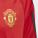 Camisola de Treino do Manchester United Collegiate Red / Solid Grey DX9028 Camisola de Treino do Manchester United Collegiate Red / Solid Grey DX9028