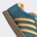 Zapatilla Stadt Active Teal / Flash Orange / Gold Metallic EF9168 Zapatilla Stadt Active Teal / Flash Orange / Gold Metallic EF9168