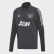 Manchester United Ultimate Training Top Carbon / Silver Met. DX9013 Manchester United Ultimate Training Top Carbon / Silver Met. DX9013