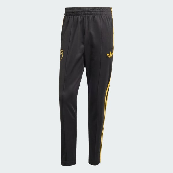 Black and gold adidas track pants discount