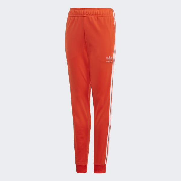 pantaloni arancioni adidas