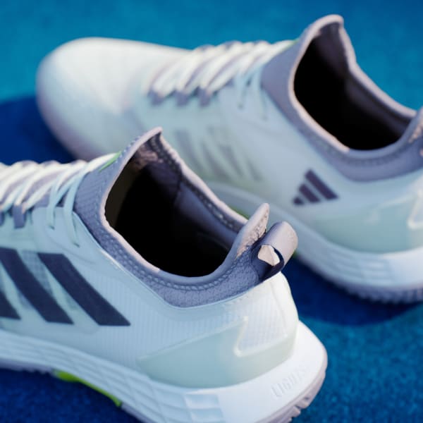 Adidas ubersonic tennis shoes 2025
