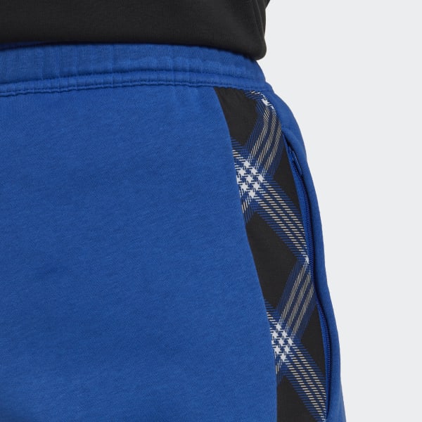Bleu Pantalon de survêtement Tiro Winterized NQ255