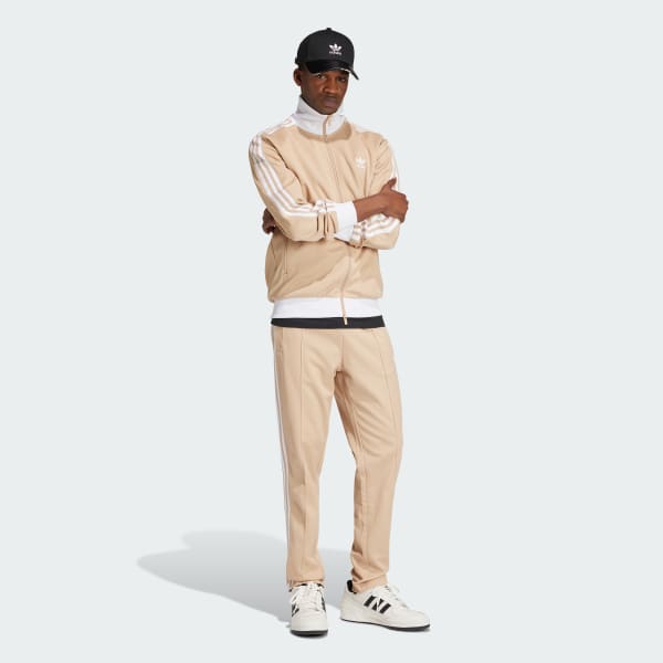 Beige adidas track pants sales
