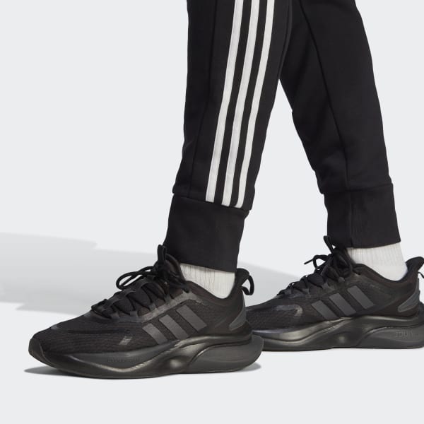 adidas Sportswear ESSENTIALS TAPERED CUFF PANTS - Tracksuit bottoms - black  white/black - Zalando