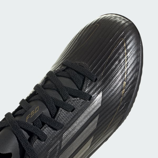 Adidas black and gold boots store