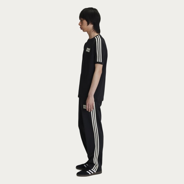adidas Originals × Oasis ツアースリーストライプス Tシャツ