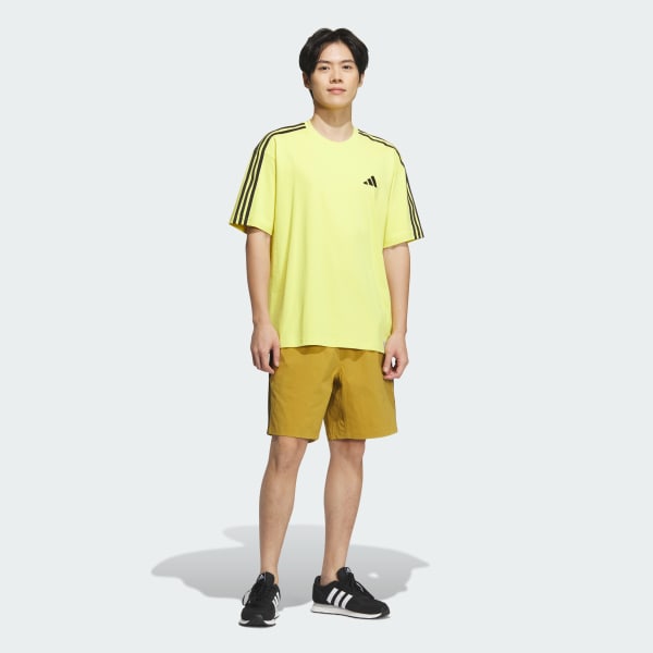 イエロー エッセンシャルズ プラス ルーズフィット スリーストライプス 半袖Tシャツ