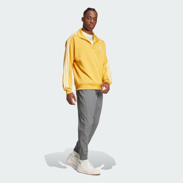 สีเหลือง เสื้อแทรคคอสูงปิดคอ Adicolor