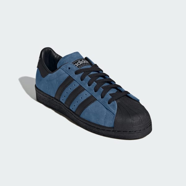 Scarpe superstar bianche e blu hot sale