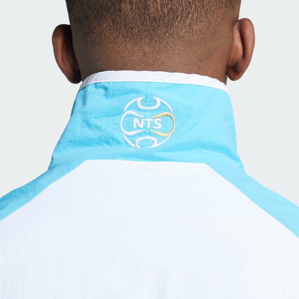 【新品】ADIDAS × NTS RADIO 総柄プリント SSTトラックトップ adidas × NTS Radio 総柄プリント SSTトラックトップ - ブラック