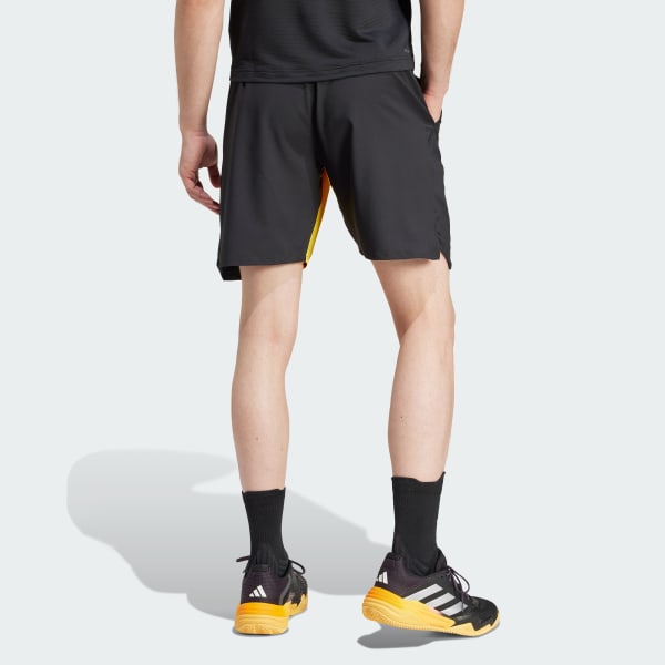 Adidas black shorts with yellow stripes online