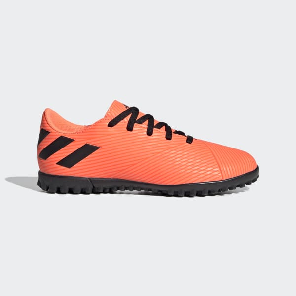 black and orange turf shoes