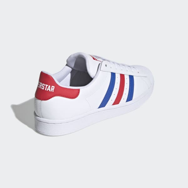 red adidas shoes with white stripes