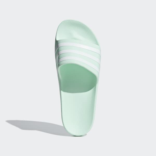 mint green adidas slides
