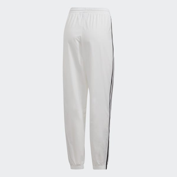 white and gold adidas track pants