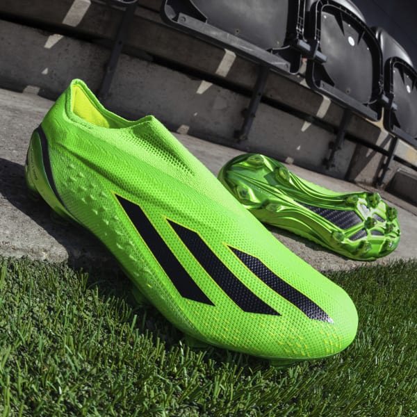 Green adidas cleats 2025