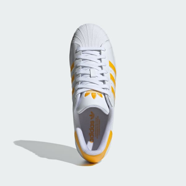 Adidas superstar white with green stripes online