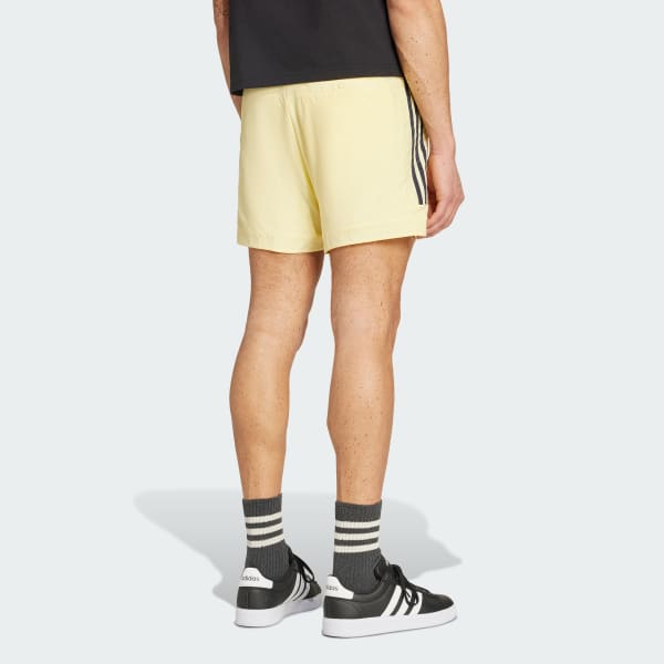 Żolty House of Tiro Woven Shorts