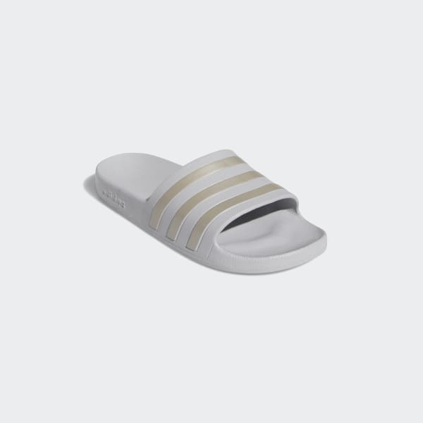 grey adilette slides