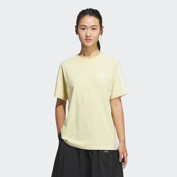 イエロー エッセンシャルズ プラス スリーストライプス 半袖Tシャツ