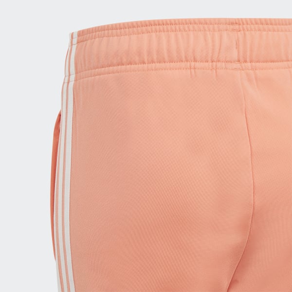 sst track pants orange