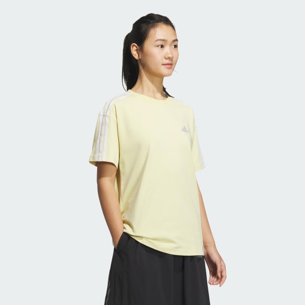 イエロー エッセンシャルズ プラス スリーストライプス 半袖Tシャツ